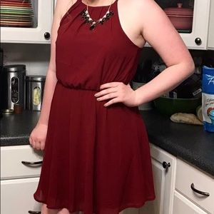 Dark red, high neck dress